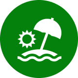 A green circle with an umbrella and sun on it.